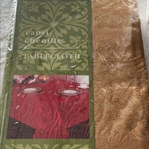 Gold Capri Chenille fabric tablecloth    120 rectangle. New in pkg